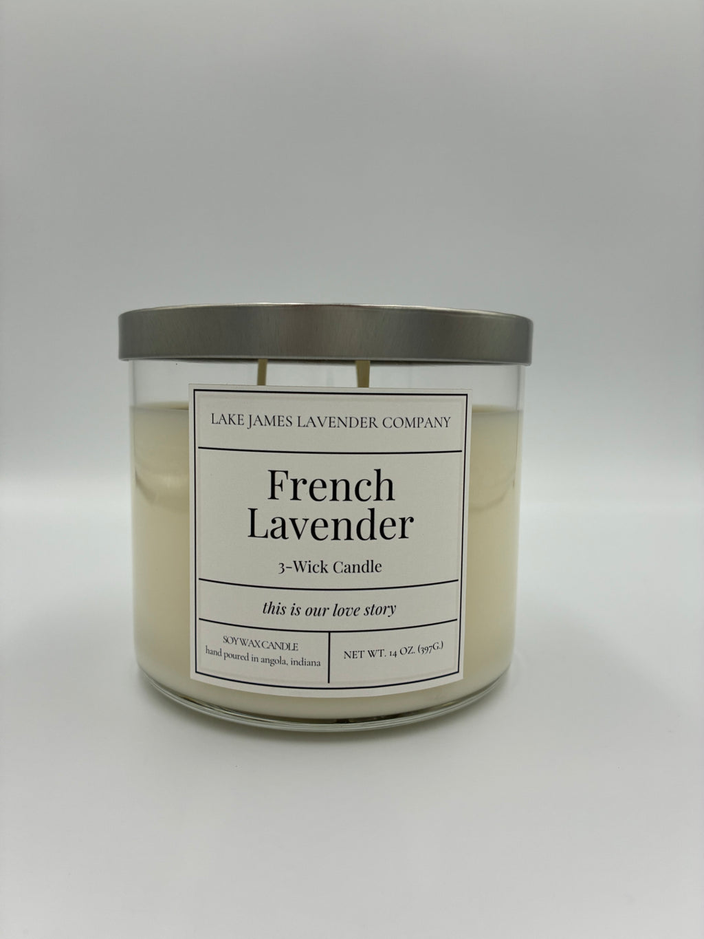 Candle with a label on a white background