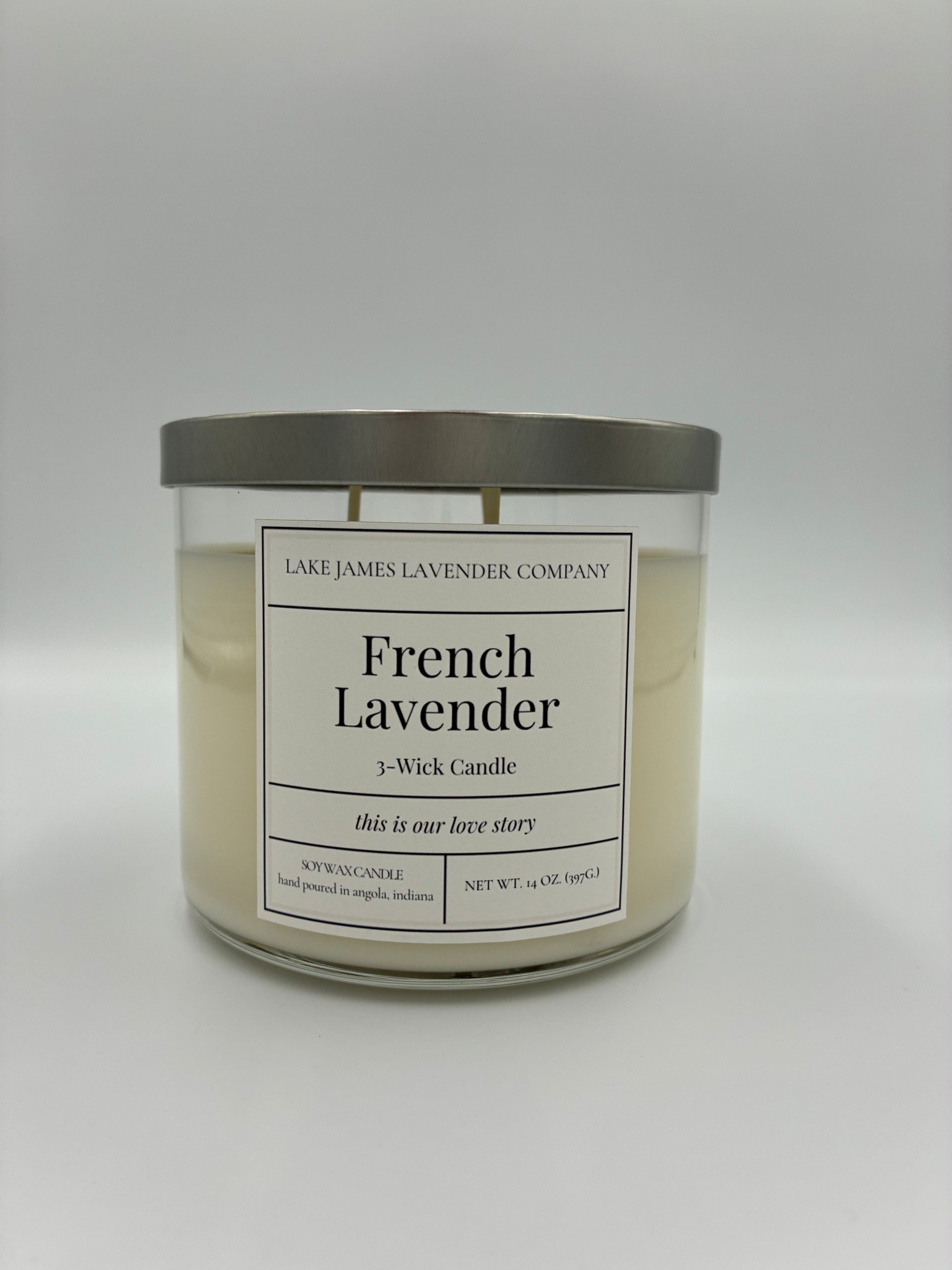 Candle with a label on a white background